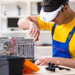 retirepc worker Refurbishing Old Electronics