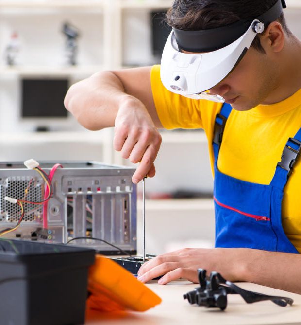 retirepc worker Refurbishing Old Electronics